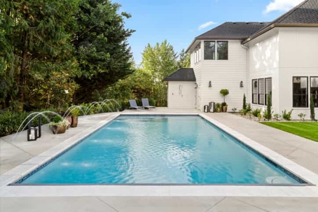 swimming pool and white house patio