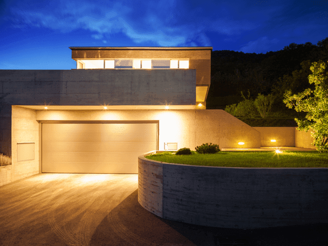 Beautiful exterior of a house that's lit up